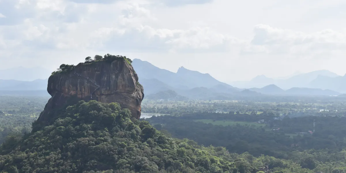 Sigiriya rock fortress rising above the jungle plains of the Cultural Triangle